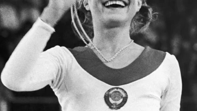 Photo of “Standing on the Bar: Olga Korbut’s Daring Move That Shocked the Olympics and Changed a Sport”